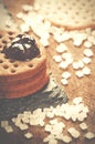 Crackers stack together with jam on top on black stone, coarse s Royalty Free Stock Photo