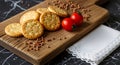 Crackers and tomatoes on wooden board Royalty Free Stock Photo