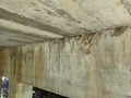 Concrete cracking under the bridge