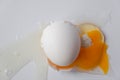 Cracking Egg.Clean background Royalty Free Stock Photo