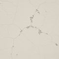 Cracking and peeling white paint on a wall, revealing the surface beneath. The texture Royalty Free Stock Photo