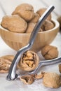 Cracking and shelling walnuts Royalty Free Stock Photo