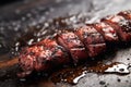 cracking some black pepper on a grilled octopus dish Royalty Free Stock Photo
