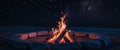 Crackling Campfire in Stone Ring at Night Royalty Free Stock Photo