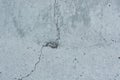 Cracks and bulges in gray concrete