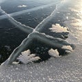 The ice is smooth and glossy, reflecting light, with the frost Royalty Free Stock Photo