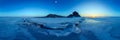 Big cracks in the ice of Lake Baikal at the Shaman Rock on Olkhon Island. Cylindrical panorama 360 Royalty Free Stock Photo