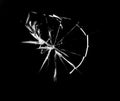 Cracks on broken glass from stone impact Abstraction of broken windshield. Royalty Free Stock Photo