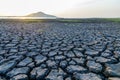 Cracks on the surface of the earth are altered by the shrinkage of mud due to drought conditions of the terrain Royalty Free Stock Photo