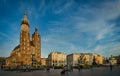 Cracow Main Square and Marian Church in warm summer evening.