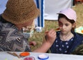 Open air fete for Ukraine refugees (mostly women and children) in Cracow, Poland.