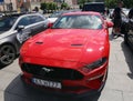 Red Ford Mustang, famous American sports car.