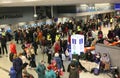 Ukrainian refugees camp out in the halls and corridors of railway station in Cracow, Poland