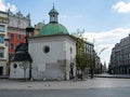 Almost empty Main Square in Krakow during coronavirus covid-19 pandemic. View over St. Wojciech Church Royalty Free Stock Photo