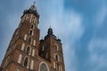 Looking up to towers of St. Mary`s Church at cloudy day Royalty Free Stock Photo