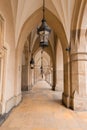 Cracow, Poland - March 19, 2020 Cloth Hall in the Old town in Cracow, Poland, Sukiennice. Arches of the cloth hall on the historic