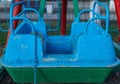Cradle part of the Soviet mini ferris wheel in an amusement park
