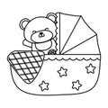 Cradle with toy bear in black and white