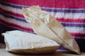 Bags with rolls on a wooden surface on a fabric background