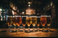 Craft beer fans at pub friends at bar table closeup of beer glasses food and drink concept Royalty Free Stock Photo