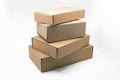 Stacked boxes of brown cardboard on a white background, recyclable material