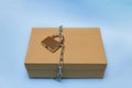 craft box wrapped with a chain and locked, prohibition, taboo Royalty Free Stock Photo
