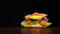 Craft burger is cooking on black background. Consist: sauce, lettuce, tomato, red onion, pickle, cheese, bacon, air bun Royalty Free Stock Photo