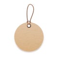 Craft cardboard label with loop and cord. Round kraft paper price tag mockup. Blank circle card hanging on string, twine Royalty Free Stock Photo
