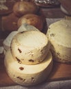 Craft cheese displayed for sale at fair market Royalty Free Stock Photo