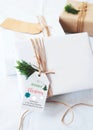 Craft and handmade Christmas present gift boxes with tag. Royalty Free Stock Photo