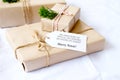 Craft and handmade Christmas present gift boxes with tag Royalty Free Stock Photo