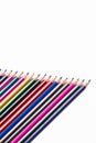 Craft Ideas. Closeup of Line of Various Colorful Crayons Placed Closely in Row. Isolated Against White Royalty Free Stock Photo