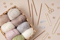 Craft knitting hobby background with yarn in natural colors
