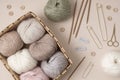 Craft knitting hobby background with yarn in natural colors