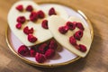 Craft premium heart-shaped white chocolate with dry raspberry