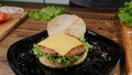 Crafting homemade burger cooking process. Cheeseburger, dish.