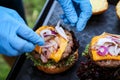 Crafting homemade burger cooking process Royalty Free Stock Photo