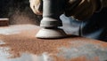 Crafting smooth surfaces with a sanding tool in a workshop space Generative AI Royalty Free Stock Photo