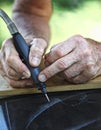 Craftman at work detail Royalty Free Stock Photo