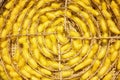 Crafts and craftsmanship. Silk raising for silk threads. Row of bamboo weave, a worm cocoons basket. Group of silkworm in yellow Royalty Free Stock Photo