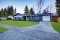 Craftsman blue one-story low-pitched roof home in Tacoma. Royalty Free Stock Photo