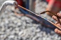 Craftsman brazing a copper pipe Royalty Free Stock Photo