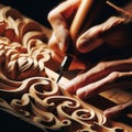 Craftsman carpenter carves ornate details in woodwork Royalty Free Stock Photo