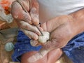 Craftsman is carving a stone into an art object Royalty Free Stock Photo