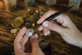 Craftsman dismantles clock and gets gears