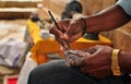 Craftsman doing stone carvings focus on hands