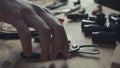 Craftsman electrician working on wiring using pair of pliers to strip Royalty Free Stock Photo