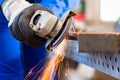 Craftsman sawing with disk grinder Royalty Free Stock Photo