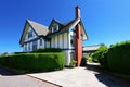 Craftsman style American house exterior with white and blue trim.