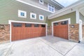 Craftsman style three-car garage parking exterior of a house Royalty Free Stock Photo